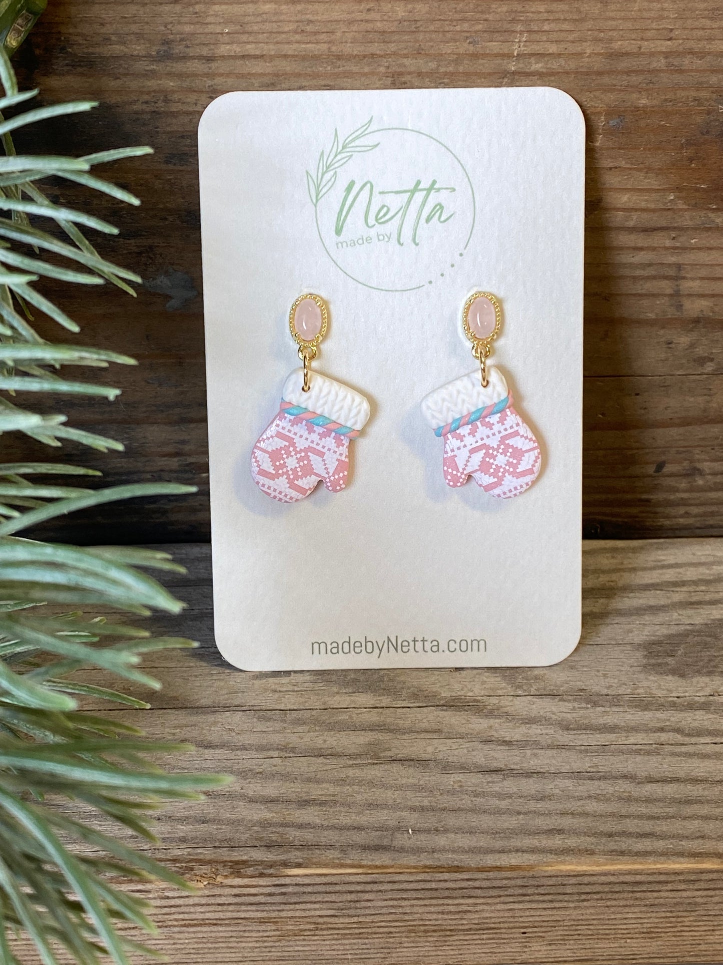 Rosa votter med selbutrykk