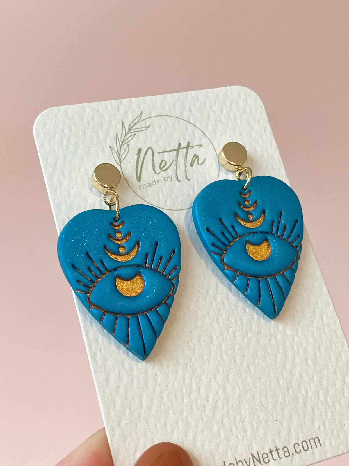 Hjerter med evil eye, blå
