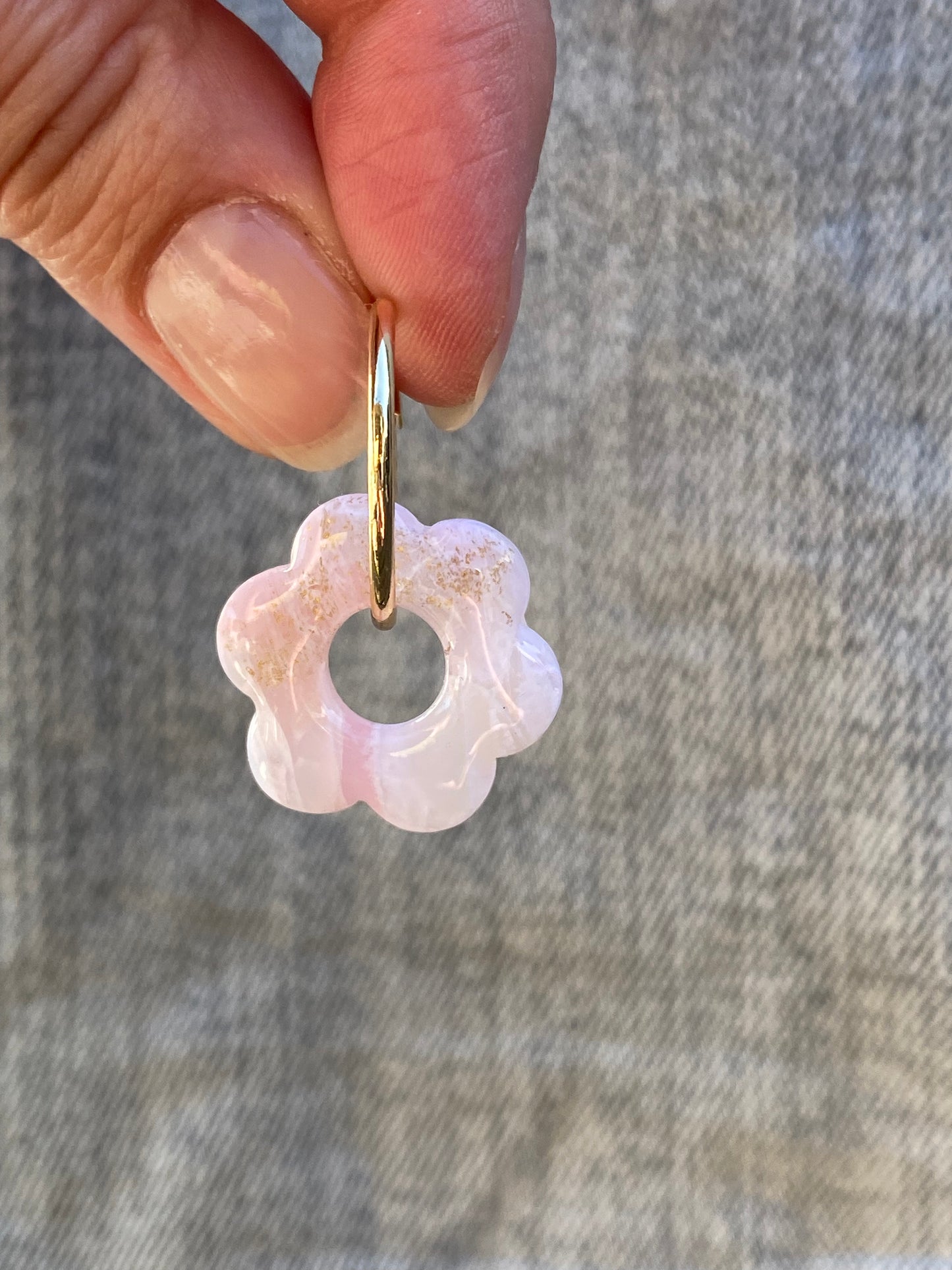 Rosa blomster på ring