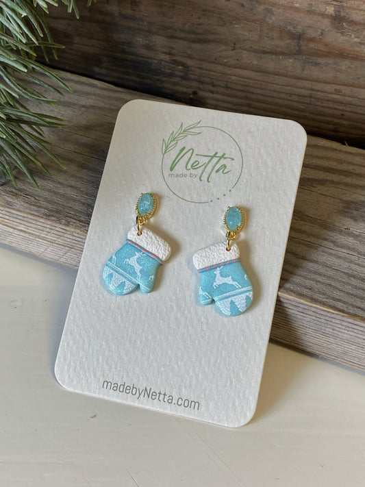 Blå votter med reinsdyr