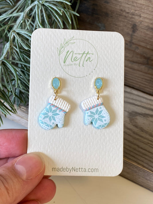 Blå votter med selbutrykk