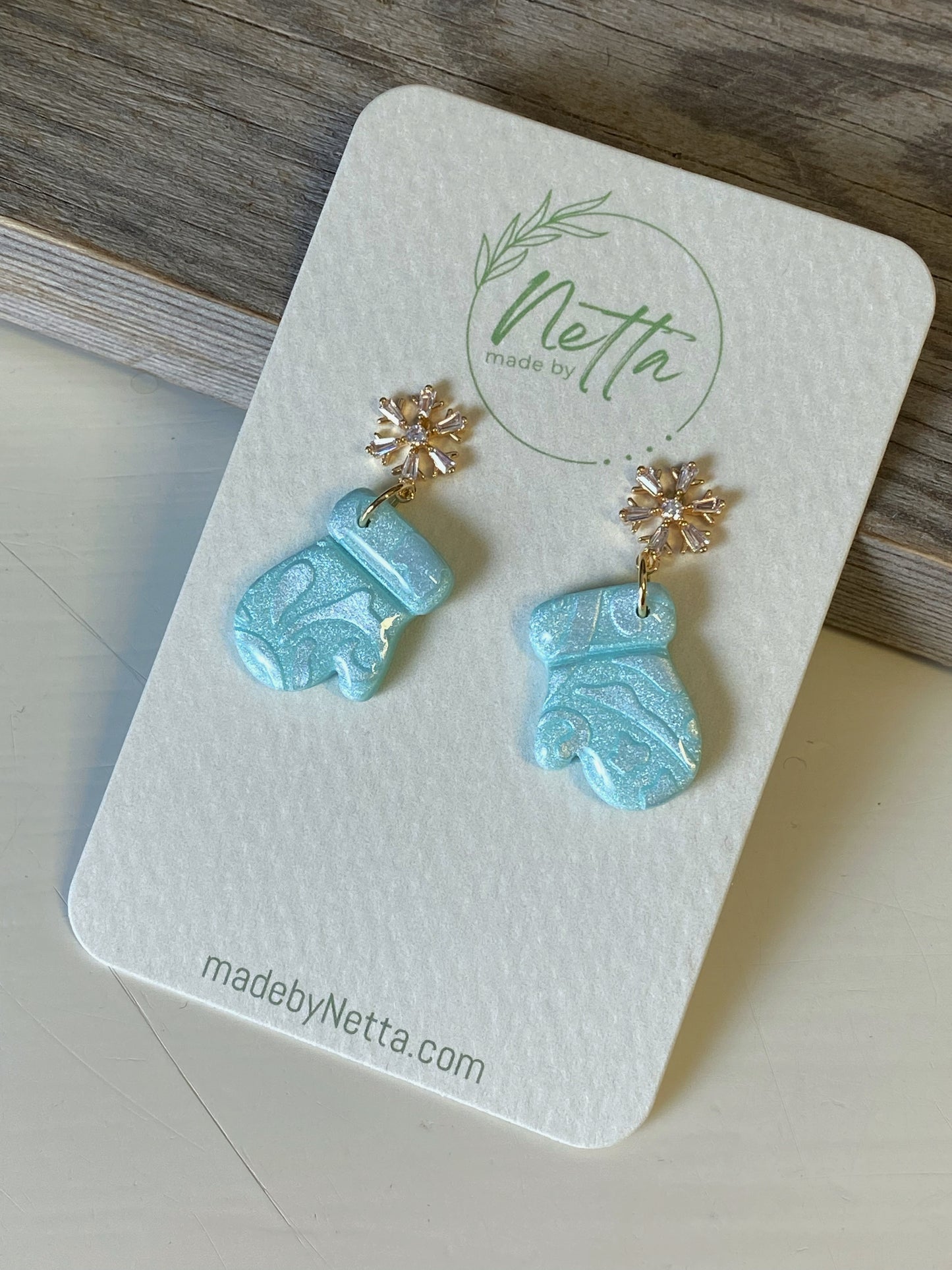 Blå votter glitrende mønster