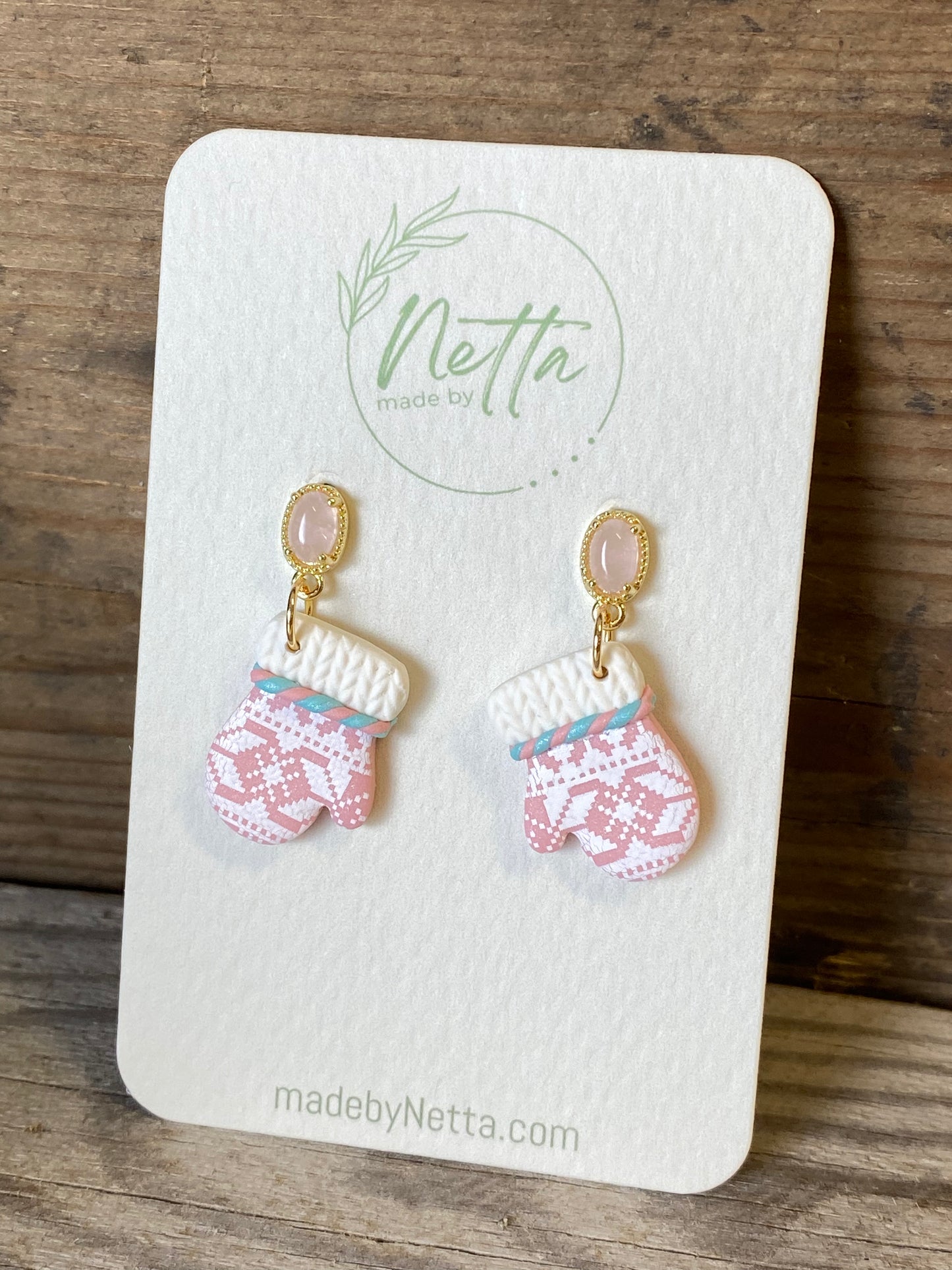 Rosa votter med selbutrykk