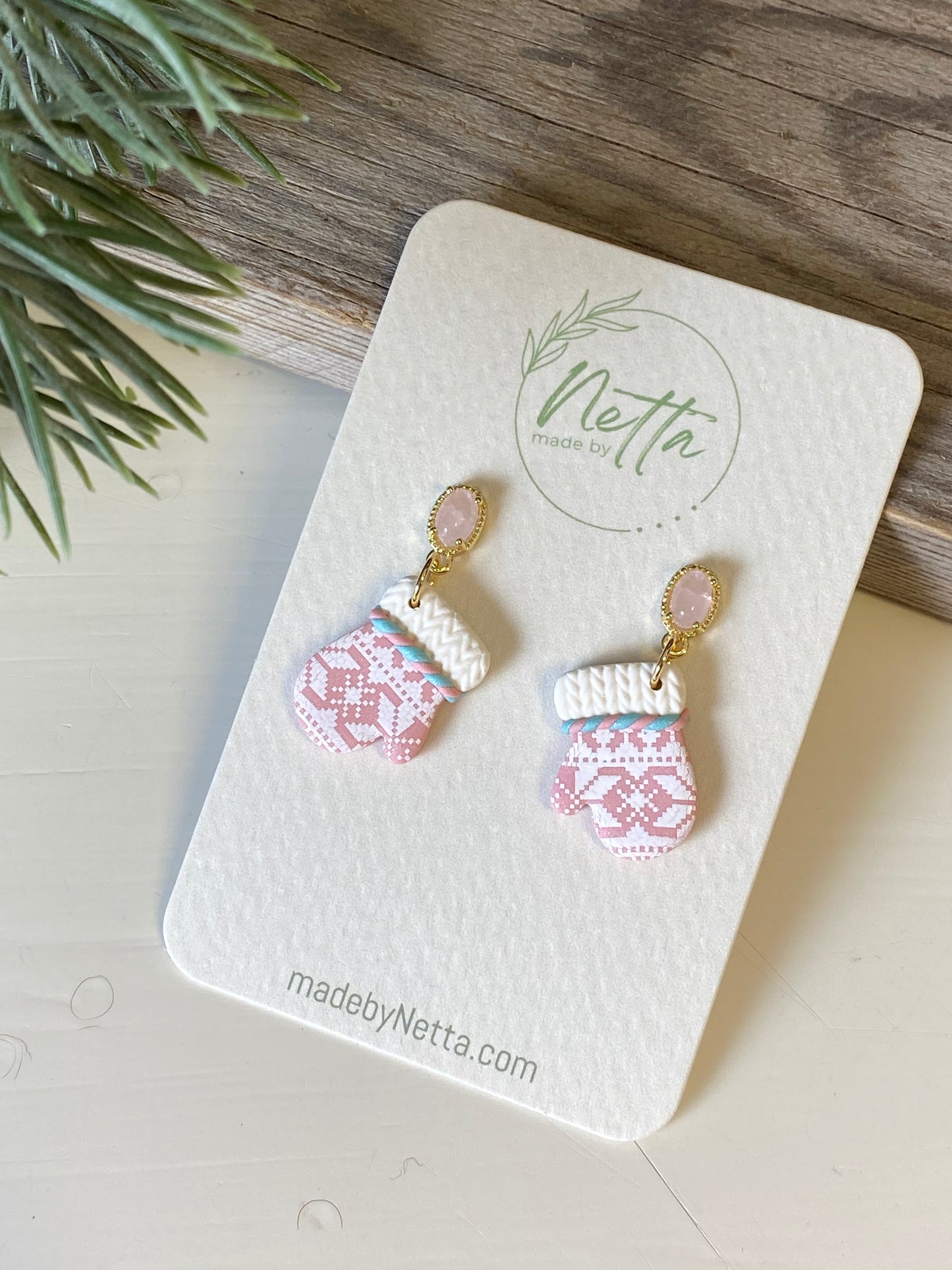 Rosa votter med selbutrykk