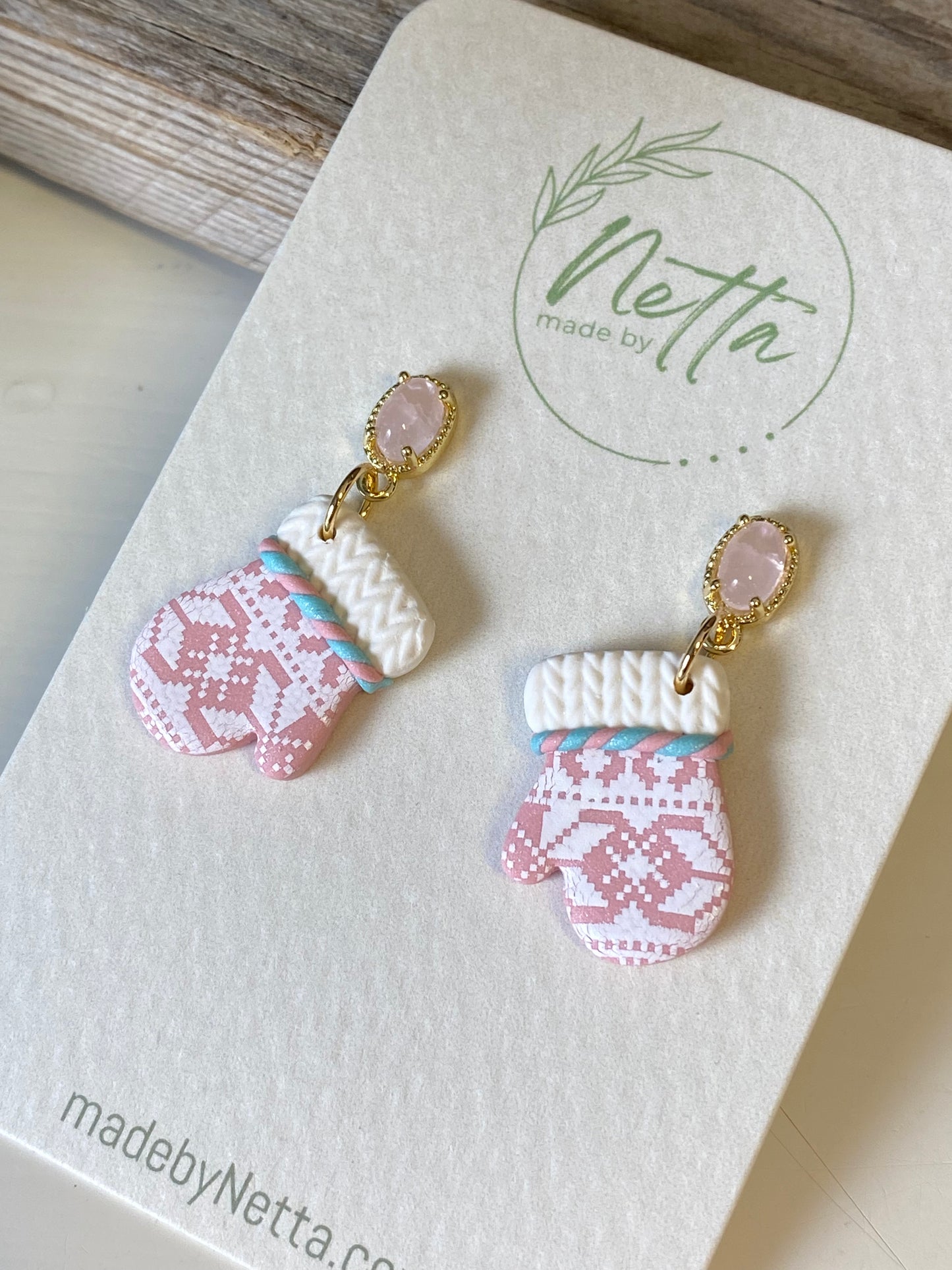 Rosa votter med selbutrykk