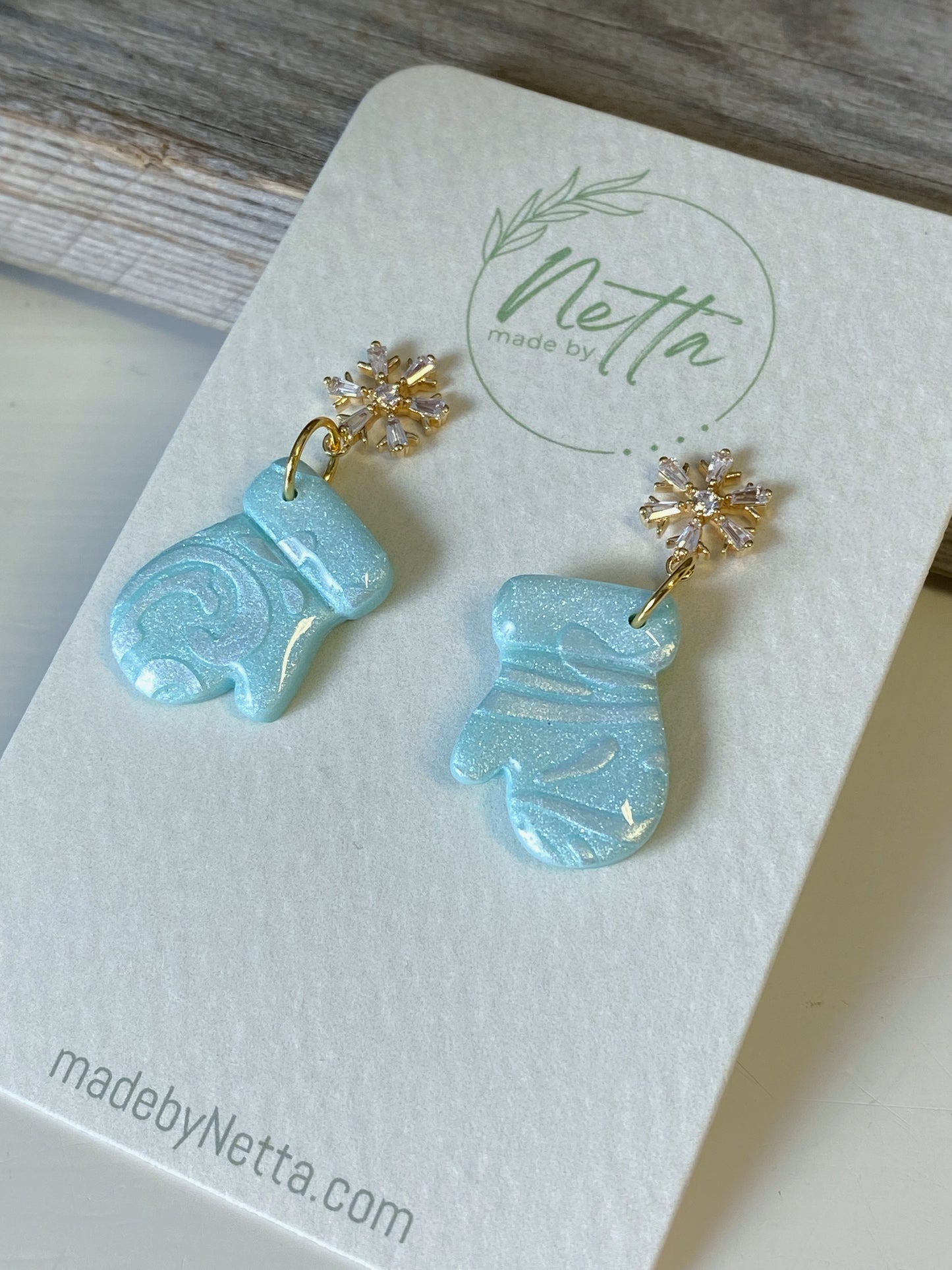 Blå votter glitrende mønster